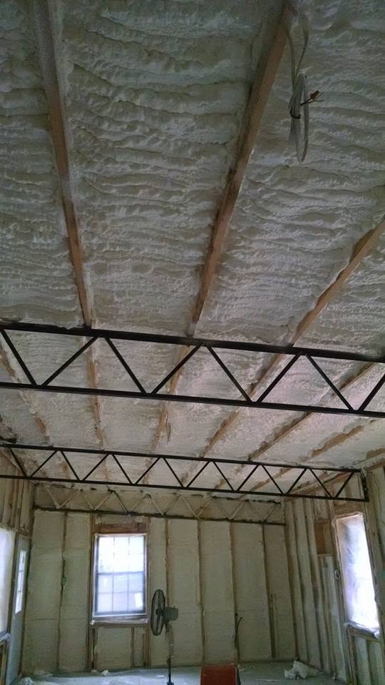 Spray foam insulation applied to a ceiling and roof deck on a NW Florida job site