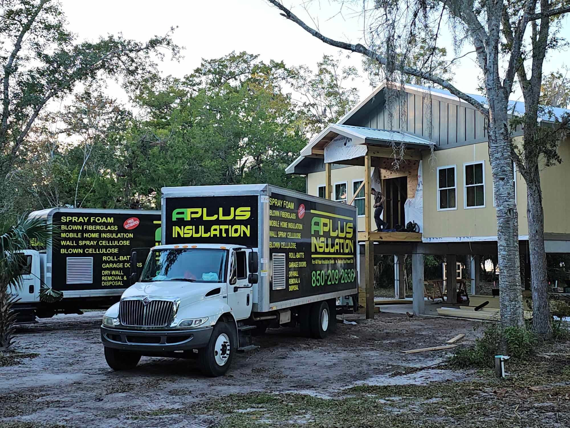 A Plus Insulation truck and equipment on a job site in Your City